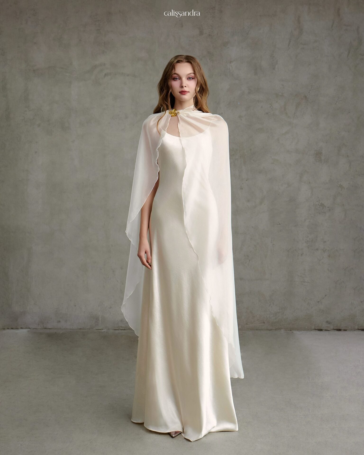 Front view of the ivory Ophelya floor-length gown